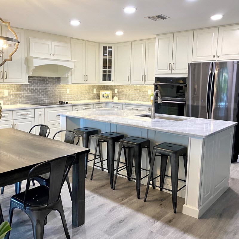 This kitchen features JSI Cabinets with the Yarmouth door style. Installation by Davis Remodeling and Construction, Inc.